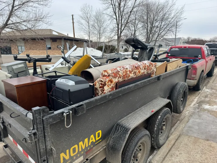 Furniture and household junk loaded in trailer for hauling